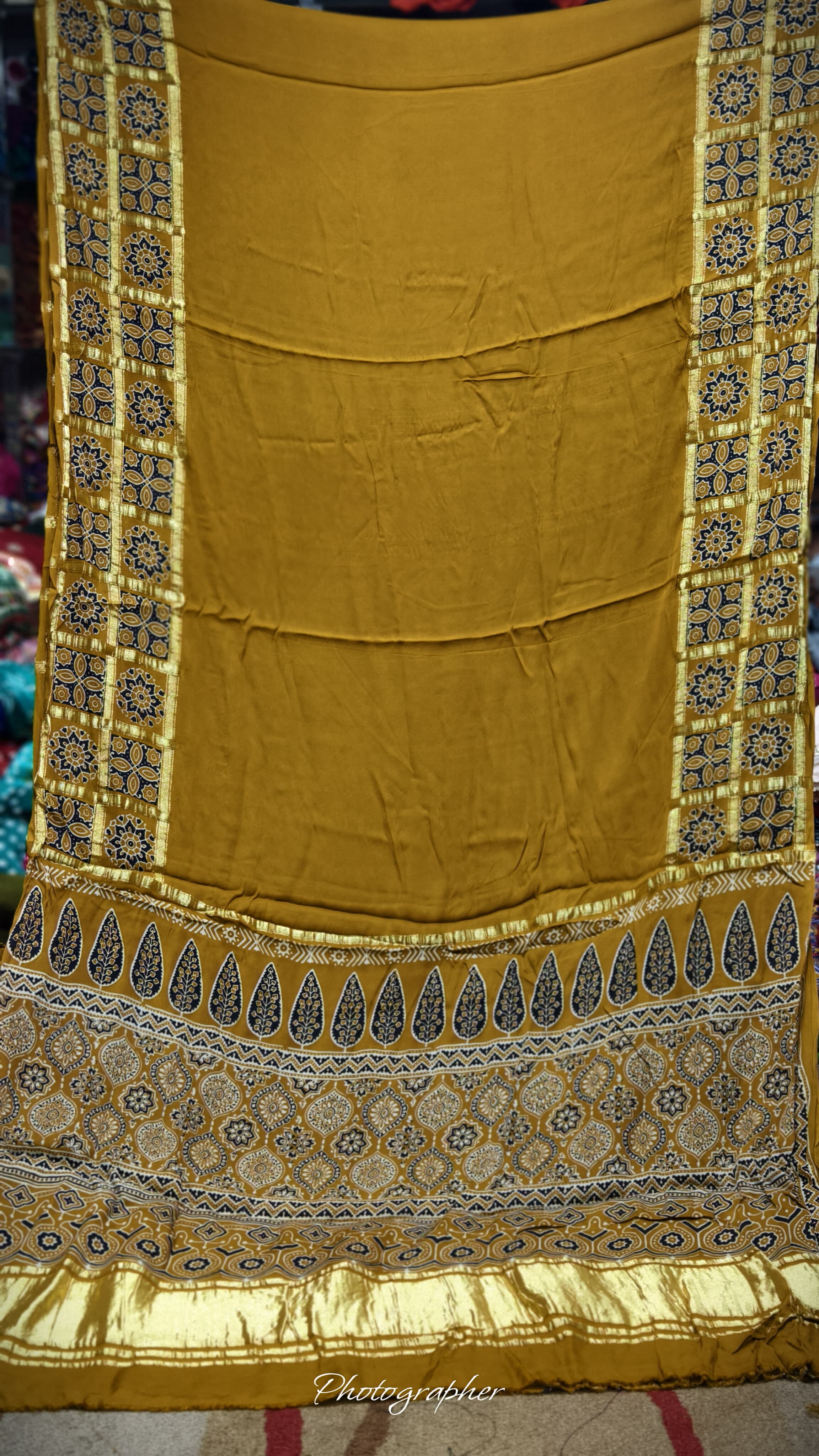 Pure Modal Gaji Silk Hand Ajrakh Print Saree With Gada Double Chex Border Design